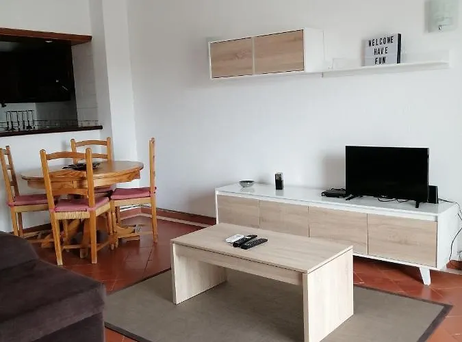 Em Албуфейра